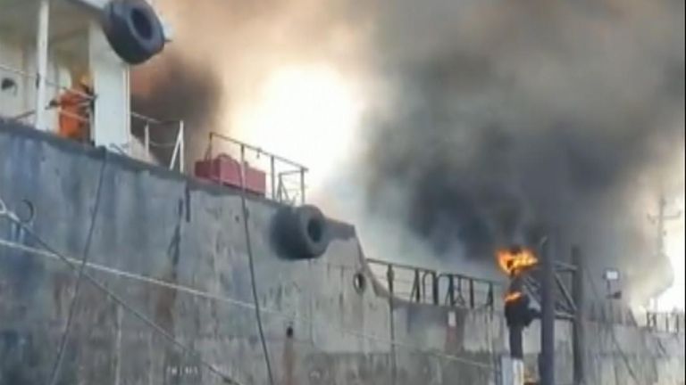 Firefighter video shows efforts to put out the resulting flames on the Smooth Sea 22.