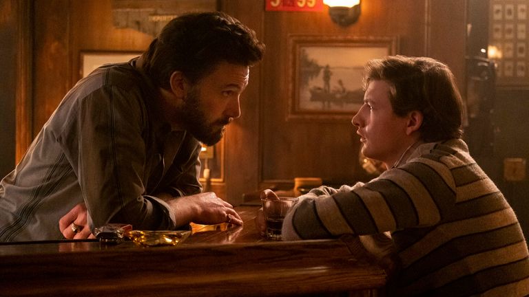 Ben Affleck, left, and Tye Sheridan in a scene from The Tender Bar. Pic: AP