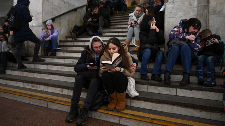 People take shelter inside a metro station during massive Russian missile attacks in Kyiv, Ukraine January 14, 2023. REUTERS/Viacheslav Ratynskyi