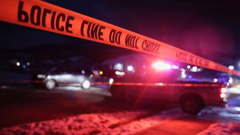 A police barricade at the scene.  Photo: Salt Lake Tribune via AP