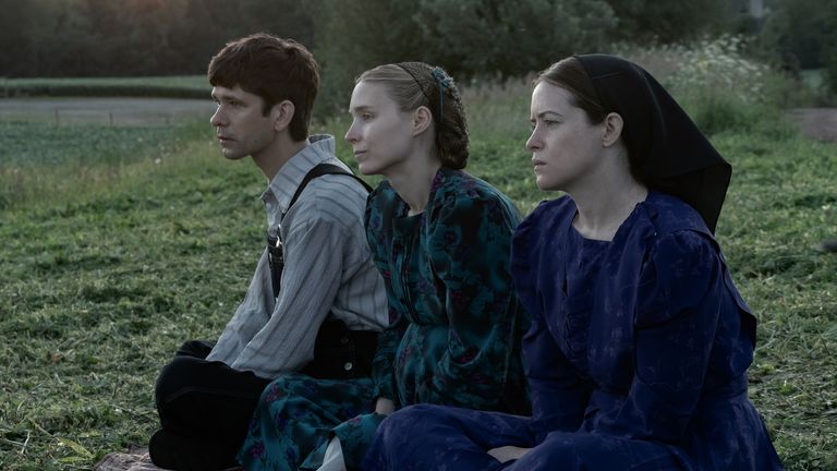 (L-R): Ben Whishaw stars as August, Rooney Mara as Ona and Claire Foy as Salome in director Sarah Polley&#39;s Women Talking. Pic: Orion Pictures/ Michael Gibson