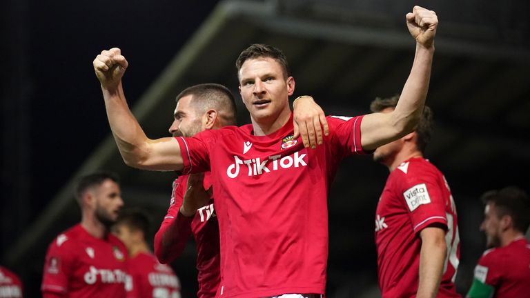 Wrexham&#39;s Paul Mullin celebrates scoring their side&#39;s third goal of the game during the Emirates FA Cup fourth round match at The Racecourse Ground, Wrexham. Picture date: Sunday January 29, 2023.