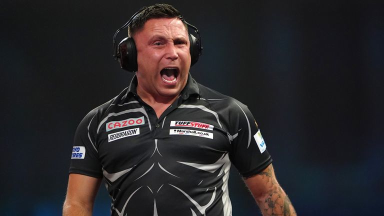 Gerwyn Price can be seen wearing ear defenders during his match against Gabriel Clemens on day fourteen of the Cazoo World Darts Championship at Alexandra Palace, London. Picture date: Sunday January 1, 2023.