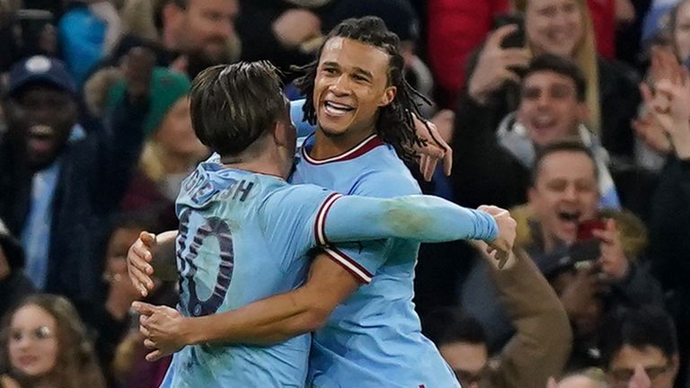 Manchester City&#39;s Nathan Ake celebrates with Jack Grealish after scoring against Arsenal