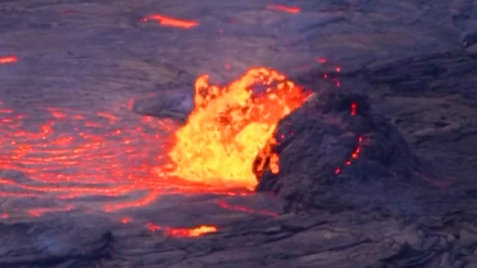 Crater erupts on Kilauea's volcano in Hawaii as geologists watch the