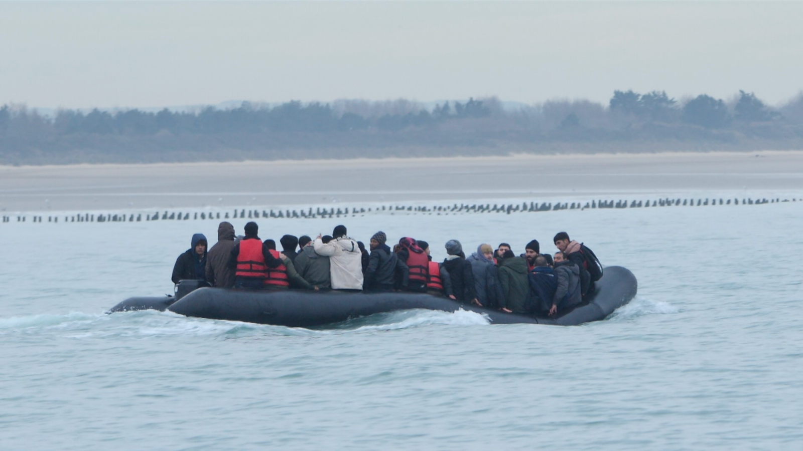 Human trafficking victims on small boats crossing Channel not breaking law, minister suggests