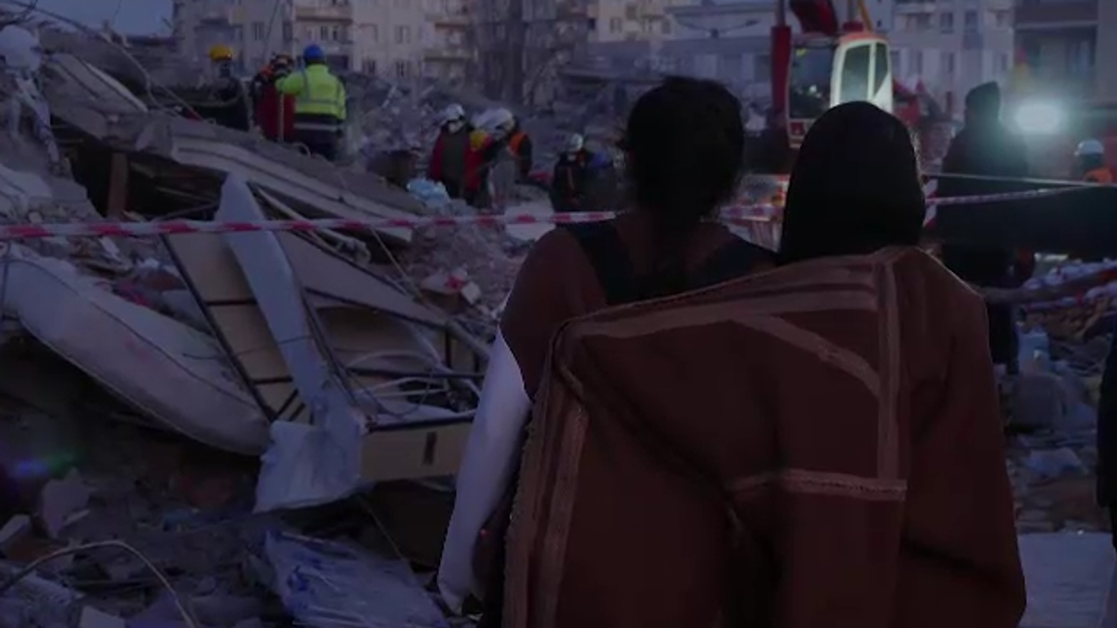 TurkeySyria earthquake Survivor caring for 10 orphans next to rubble
