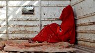 A seven-year-old child bride sits in the back of a truck as she waits for the rest of her family members after being wed. File pic: AP