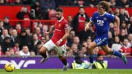 Leicester City&#39;s Wout Faes (right) and Manchester United&#39;s Bruno Fernandes during a Premier League match at Old Trafford Stadium,