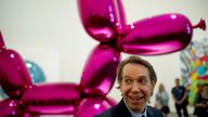 Jeff Koons in front of another of his balloon dog sculpture&#39;s at a retrospective of his work in Bilbao in 2015.