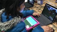 A girl playing Minecraft. Pic - Minecraft: Education Edition