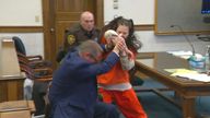 Taylor Schabusiness attacks her attorney, Quinn Jolly, in Brown County court in Green Bay, Wis., on Tuesday, Feb. 14, 2023. Schabusiness is charged with first-degree intentional homicide, mutilating a corpse and third-degree sexual assault in the killing of Shad Thyrion, 25, in February 2022. (WLUK/Tim Flanigan via AP)


