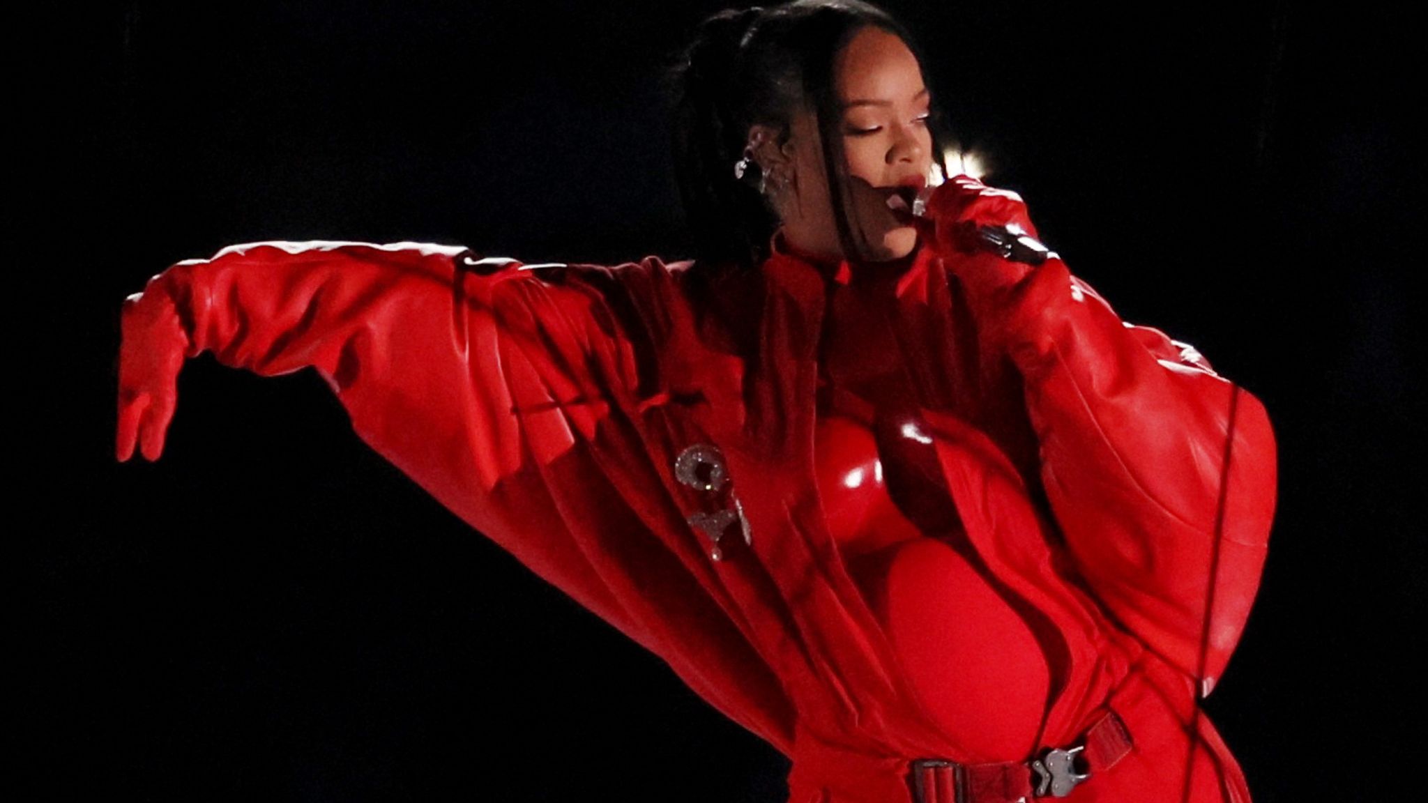 Pregnant Rihanna wows Super Bowl in all-red ensemble