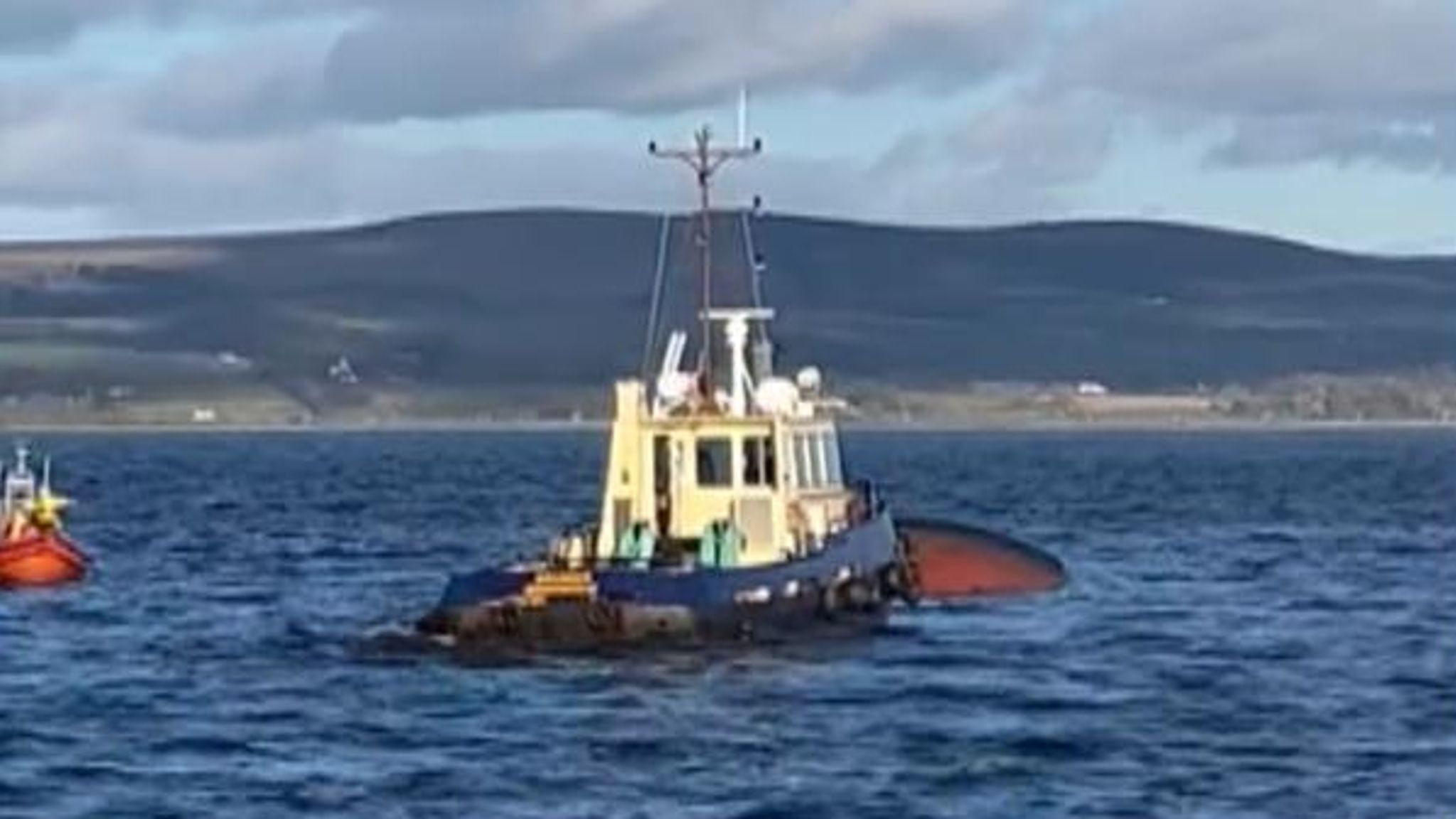 Boat capsizes near Greenock Search resumes in Scotland after tugboat