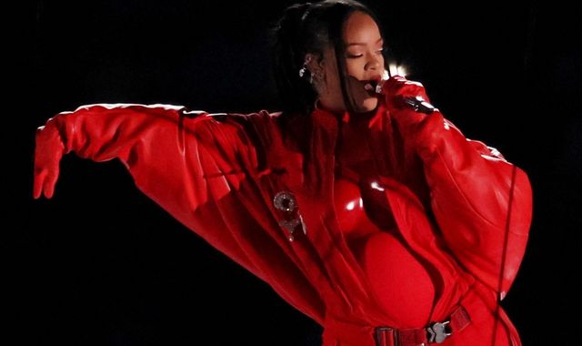 Rihanna reveals pregnancy as she shows off bump during half-time show ...