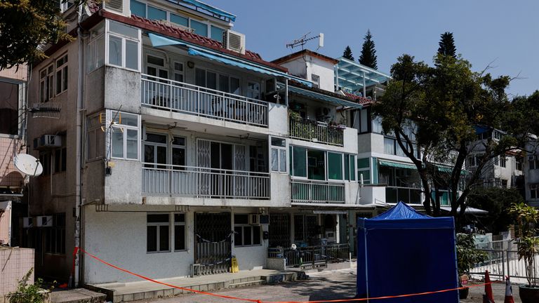 Cordons lines are seen outside a village house where part of Abby Choi&#39;s body was found in Hong Kong 