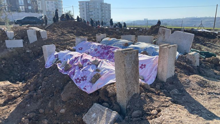 The dead are buried in Adiyaman, following an earthquake in Turkey.