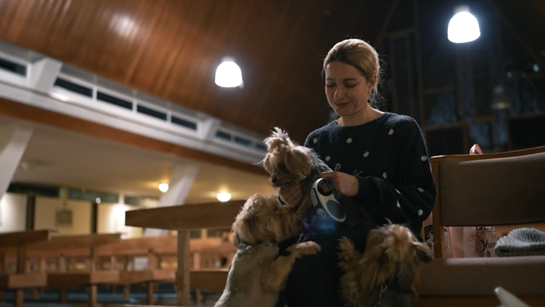 Ukrainian refugee Anfisa Vlasova with her mini Yorkshire terriers Betsy, Nora, Daisy and Teddy.