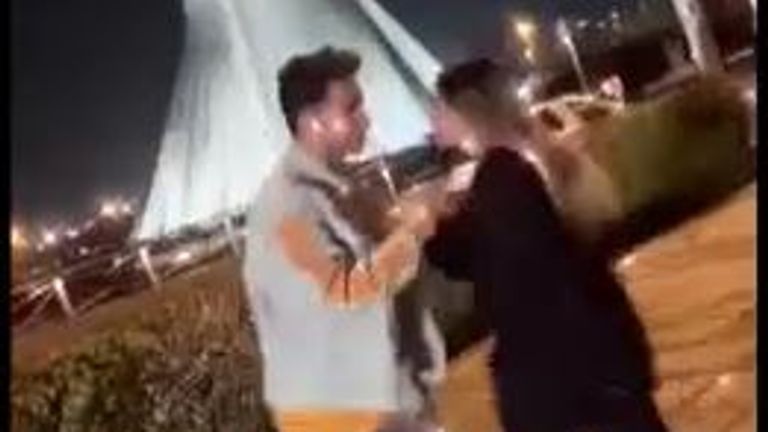 Astiaj Haghighi and her fiance Amir Mohammad Ahmadi dancing at Azadi Tower