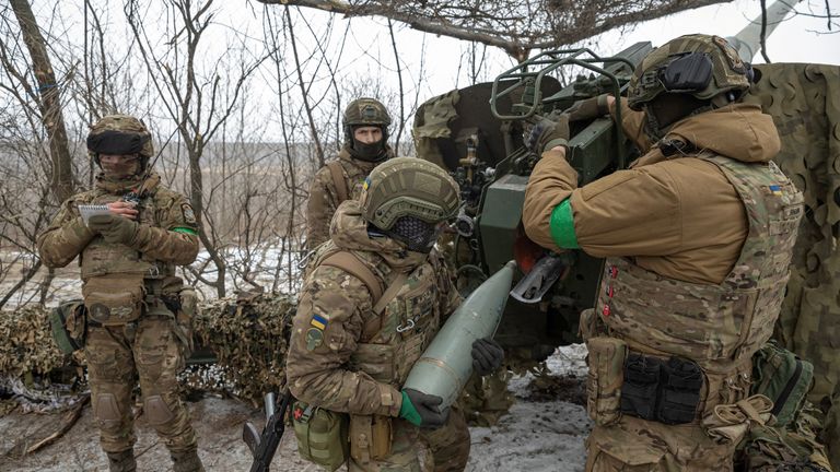 Members of the 3rd Separate Assault Brigade (Azov Unit) of the Armed Forces of Ukraine prepare to fire 152 mm howitzer 2A65 Msta-B, amid Russia&#39;s attack on Ukraine