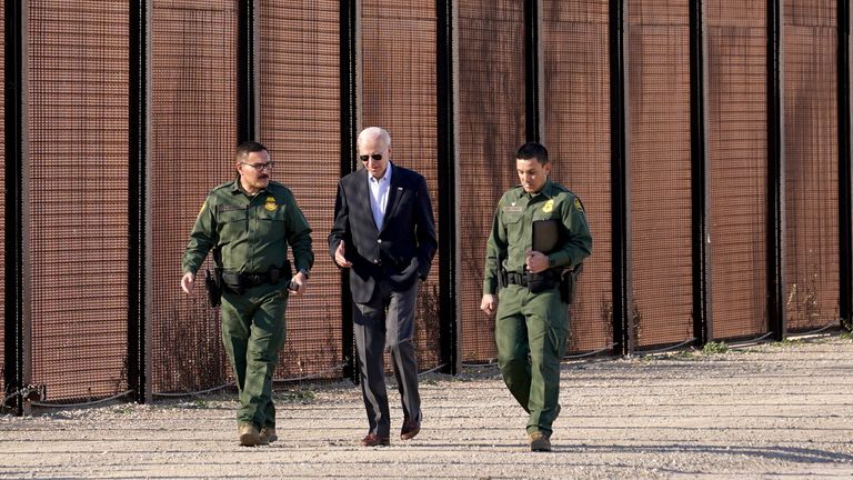 Joe Biden speaks with border patrol officers during his visit to the U.S.-Mexico border in January