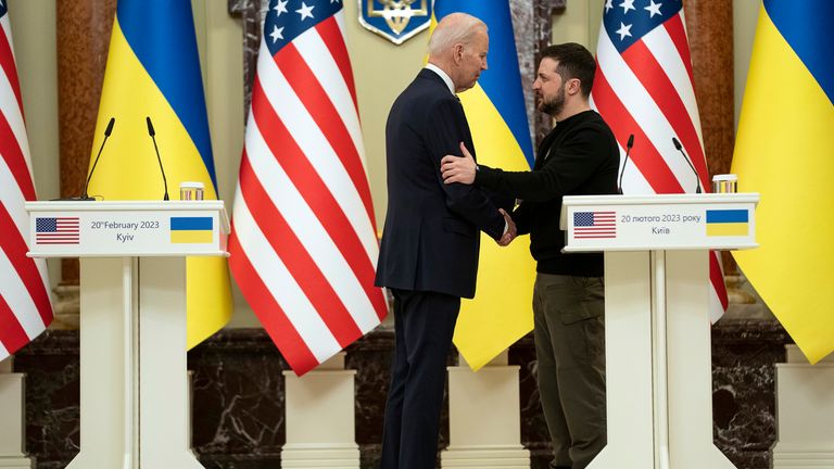 US President Joe Biden shakes hands with Ukrainian President Volodymyr Zelenskyy after delivering statements at Mariinsky Palace on an unannounced visit in Kyiv, Ukraine, Monday, Feb. 20, 2023. (AP Photo/Evan Vucci)