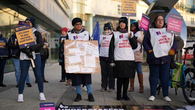 Workers on the picket line outside Queen Elizabeth hospital in Birmingham during a strike by nurses and ambulance staff. Picture date: Monday February 6, 2023.