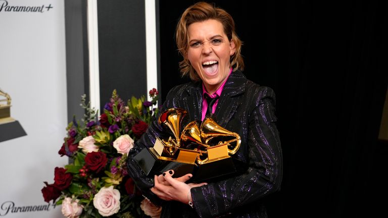 Brandi Carlile, winner of the awards for best rock song for "Broken Horses," best americana album for "In These Silent Days" and best rock performance for "Broken Horses," poses in the press room at the 65th annual Grammy Awards on Sunday, Feb. 5, 2023, in Los Angeles. (AP Photo/Jae C. Hong)