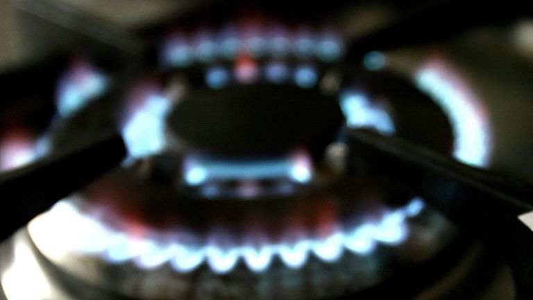 File photo of a gas hob with a bill from supplier British Gas