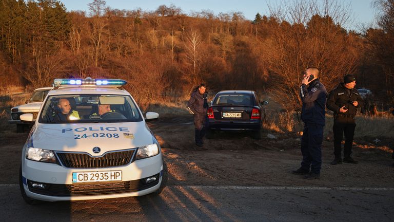 An ambulance leaves the site after at least 18 people were found dead in Bulgaria in an abandoned truck near the capital Sofia, according to the Bulgarian Interior Ministry, in Bulgaria, February 17, 2023. REUTERS/Stoyan Nenov
