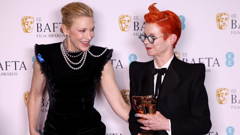 Sandy Powell poses with her BAFTA Fellowship Award alongside the award presenter Cate Blanchett during the 2023 British Academy of Film and Television Arts (BAFTA) Film Awards at the Royal Festival Hall in London, Britain, February 19, 2023. REUTERS/Henry Nicholls 