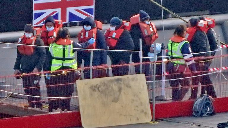 A group of people thought to be migrants are brought in to Dover, Kent, from a Border Force vessel following a small boat incident in the Channe