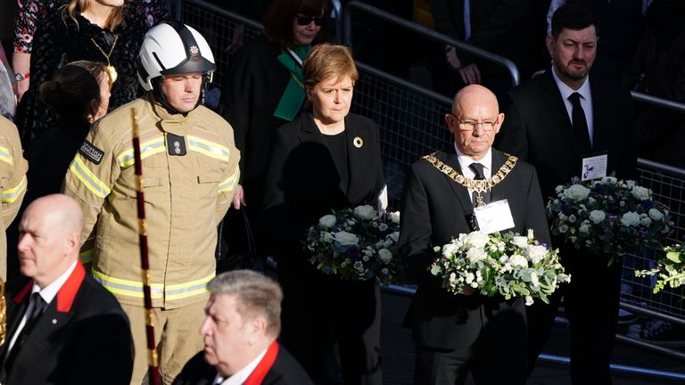 Lord Provost of Edinburgh Robert Aldridge (2nd-right) and First Minister Nicola Sturgeon (centre) arriving at St Giles&#39; Cathedral in Edinburgh for the funeral of firefighter Barry Martin who died while fighting a fire at Edinburgh&#39;s historic Jenners building. Picture date: Friday February 17, 2023.