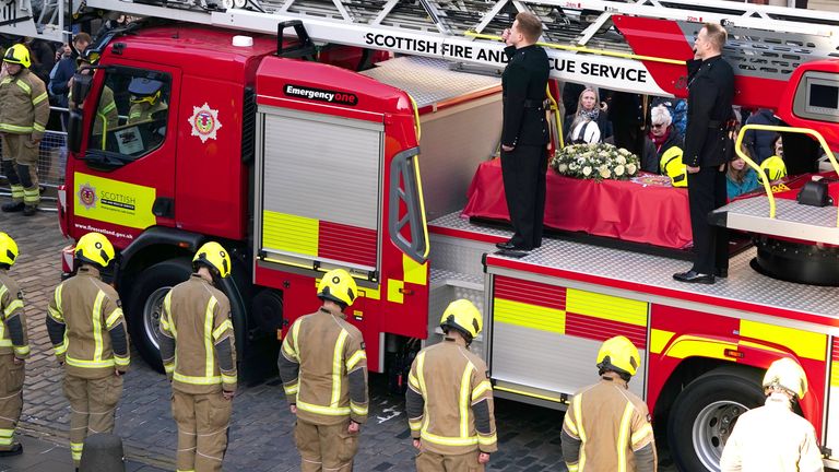 The coffin of Barry Martin arrives on a fire engine outside St Giles&#39; Cathedral in Edinburgh, ahead of his funeral, firefighter Barry Martin died while fighting a fire at Edinburgh&#39;s historic Jenners building. Picture date: Friday February 17, 2023.