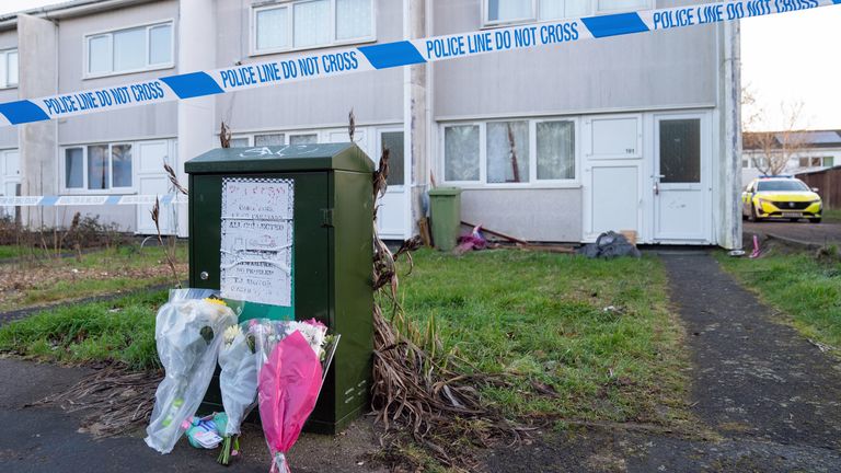 Flowers at the scene on Broadlands, Netherfield, Milton Keynes, Buckinghamshire, where a four-year-old girl has died following reports of a dog attack in the back garden of a property. Picture date: Wednesday February 1, 2023.