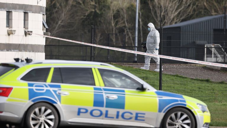 A police forensic investigator at the sports complex in the Killyclogher Road area of Omagh, Co Tyrone, where off-duty PSNI Detective Chief Inspector John Caldwell was shot a number of times by masked men in front of young people he had been coaching. Mr Caldwell remains in a critical but stable condition in hospital following the attack on Wednesday evening. Picture date: Thursday February 23, 2023.