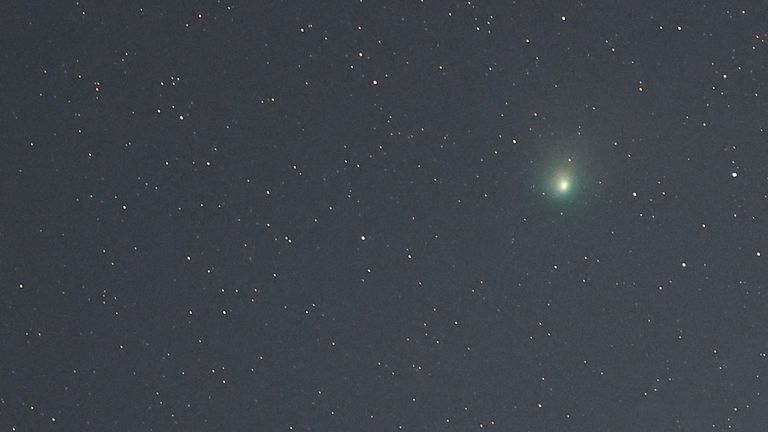 A green comet named Comet C/2022 E3 (ZTF), which last passed by our planet about 50,000 years ago is seen from the Pico de las Nieves, in the island of Gran Canaria, Spain, February 1, 2023. REUTERS/Borja Suarez