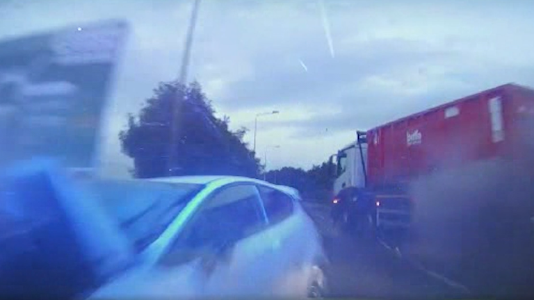 The video shows the car rebounding off the lorry and hitting the police car. Pic: Humberside Police