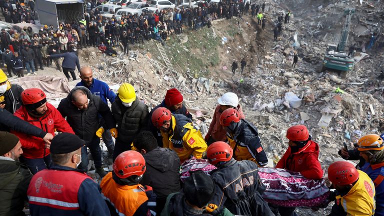 Rescuers carry 20-year-old survivor Ibrahim Kantrji, in the aftermath of a deadly earthquake, in Kahramanmaras, Turkey 