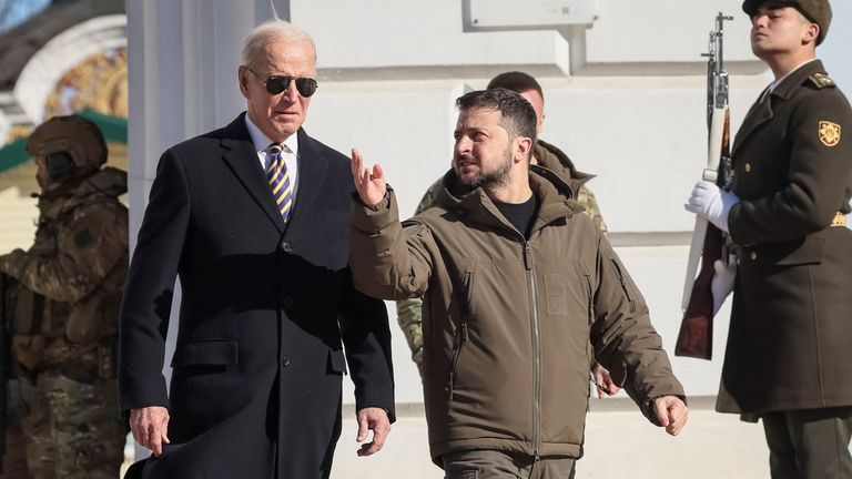 U.S. President Joe Biden and Ukraine&#39;s President Volodymyr Zelenskiy walk next to Saint Michael’s cathedral, amid Russia&#39;s attack on Ukraine, in Kyiv, Ukraine February 20, 2023. REUTERS/Gleb Garanich