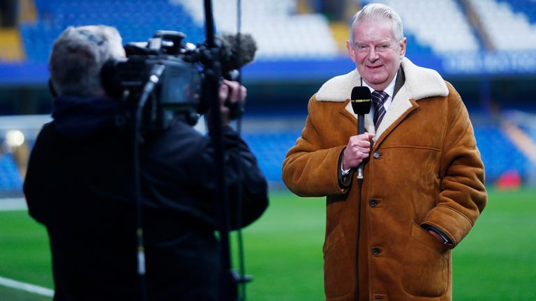 John Motson doing television work in the ground before the match between Chelsea and Stoke City
