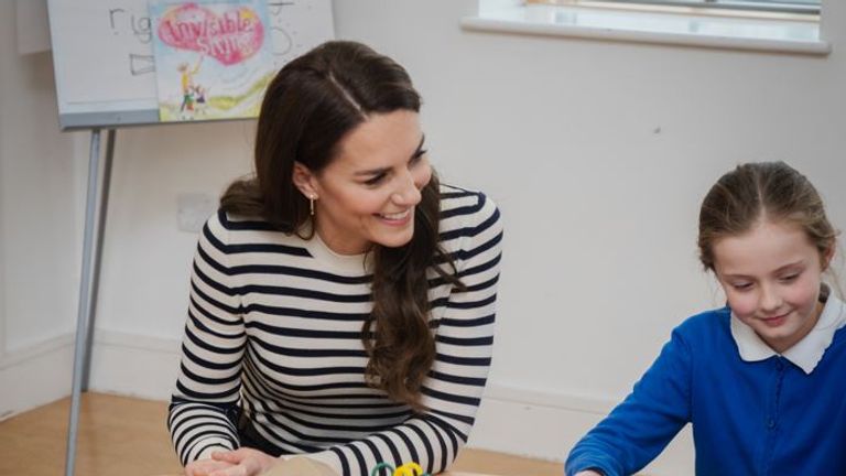 Kate is seen smiling with the children, Pic: PA