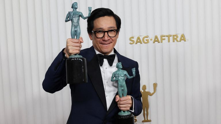 Ke Huy Quan poses with the awards for Outstanding Performance by a Male Actor in a Supporting Role and Outstanding Performance by a Cast in a Motion Picture for “Everything Everywhere All at Once” during the 29th Screen Actors Guild Awards at the Fairmont Century Plaza Hotel in Los Angeles, California, U.S., February 26, 2023. REUTERS/Aude Guerrucci