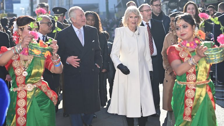 King Charles III and the Queen Consort during a visit to Brick Lane