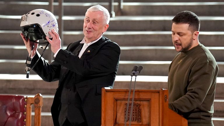 Speaker of the House of Commons, Sir Lindsay Hoyle (left), holds the helmet of one of the most successful Ukrainian pilots, inscribed with the words "We have freedom, give us wings to protect it", which was presented to him by Ukrainian President Volodymyr Zelensky as he addressed parliamentarians in Westminster Hall, London, during his first visit to the UK since the Russian invasion of Ukraine. (Stefan Rousseau/PA)should read: Stefan Rousseau/PA Wire