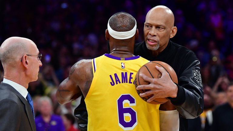  Los Angeles Lakers forward LeBron James (6) takes a ball from Kareem Abdul-Jabbar after breaking the record for all-time scoring in the NBA during the third quarter against the Oklahoma City Thunder at Crypto.com Arena
Credit:Gary A. Vasquez-USA TODAY Sports