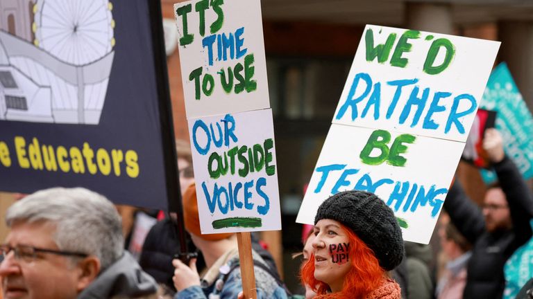 Teachers attend a march during strike action in dispute over pay, in Manchester, Britain, February 28, 2023. REUTERS/Phil Noble