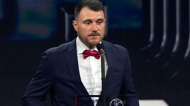 Polish amputee football player Marcin Oleksy speaks after he received the FIFA Puskas Award for the best goal during the ceremony Pic: AP
