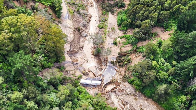 A road between Napier and Wairoa is washed out by floodwater. Pic: AP