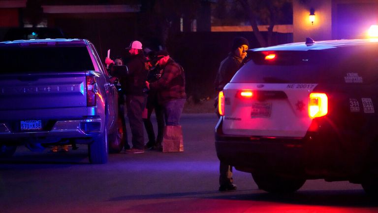 Las Vegas police work near the home of former actor Nathan Lee Chasing His Horse, who goes by Nathan Chasing Horse, Tuesday, Jan. 31, 2023, in North Las Vegas, Nev. Authorities raided the home of the former actor Tuesday in connection with a sexual assault investigation. (AP Photo/John Locher)